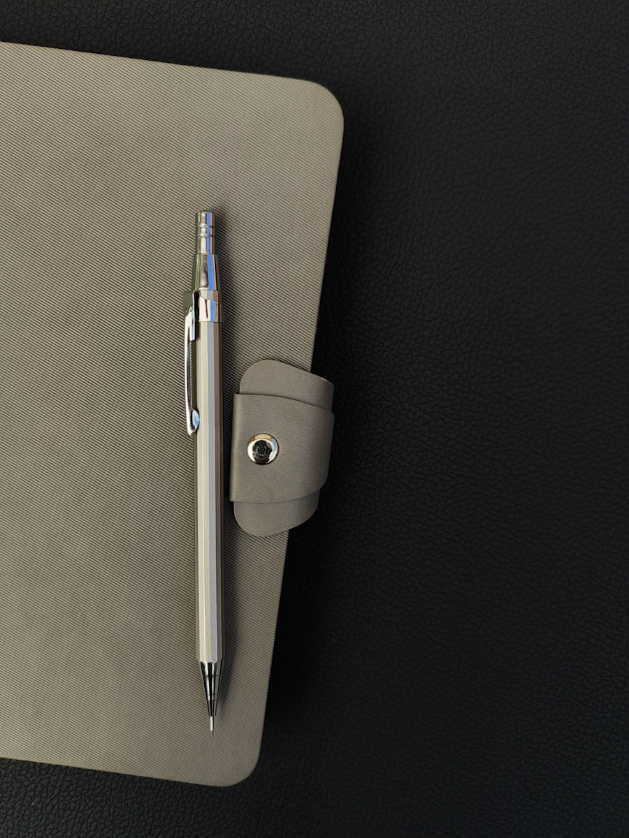 black swivel chair beside rectangular brown wooden desk